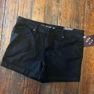 Ava and Viv. Black shorts.